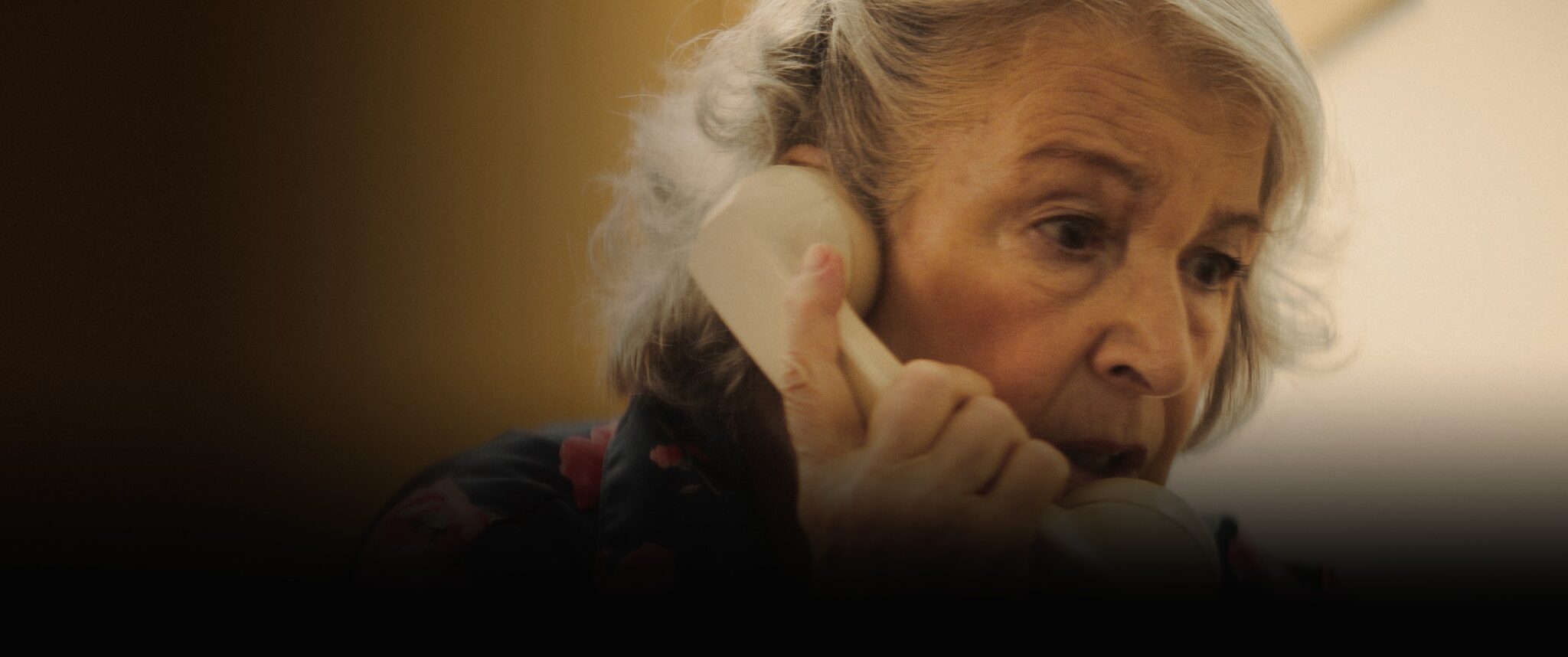 La Truffa, a film by Matteo Stipa and Michele Marchionne: Mirella on the phone with an ivory receiver